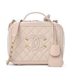 Chanel caviar quilted cc filigree vanity case beige bag full set @authenticfab. Chanel Caviar Quilted Medium Cc Filigree Vanity Case Light Beige 422495 Fashionphile