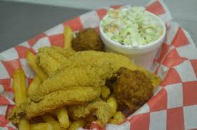 As for catfish condiments, a dab of ketchup and tartar sauce and a squeeze of lemon are high on our list. Catfish Dinner Served With Two Sides And Two Hushpuppies Picture Of Eat My Catfish Of Conway Tripadvisor