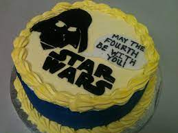 This cake was being served at my college for everyone and i had to take a picture! May The 4th Be With You Star Wars Cake Cake Star Wars Cake Desserts