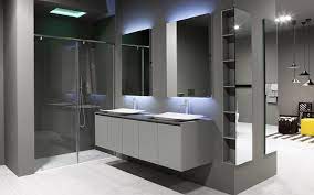 Industrial bathroom with geometric washbasin. Designer Bathrooms By Michael