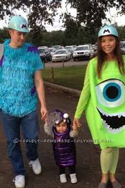 The homemade sully costume was created by faux fur and paper mache. Sully Mike And Boo From Monsters Inc Family Halloween Costumes Family Halloween Family Costumes
