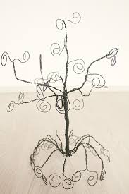 Wire art may be one of the more interesting ways to create a beautiful canvas. Diy Jewelry Holder Tree Made Out Of Wire