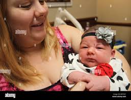 Amber Buckley of Kirkwood, Missouri holds her new baby Shiloh, hours after  her birth at St. Anthony's Medical Center in St. Louis