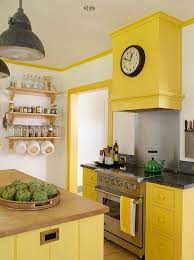 The warm, bright tones can. Yellow Kitchen Cabinets Country Kitchen