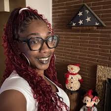 Flint neighborhood with mid-20s Tudors and Colonials