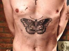 The official website of harry styles. The Meaning Behind Harry Styles Tattoos Harry Styles Tattoos