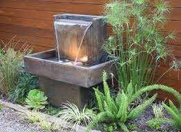 12 Relaxing Water Feature Ideas For Small Gardens Mymove Water Fountains Outdoor Fountains Backyard Garden Water Feature