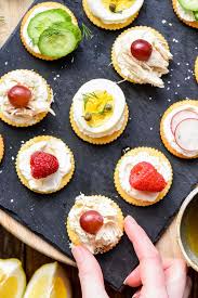 Once your cracker is filled, repeat the previous step, gathering and tying off the open end. 5 Ritz Cracker Appetizers You Can Make In 5 Minutes Neighborfood