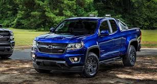 L To R 2016 Chevrolet Colorado Midnight Edition And Trail Boss Chevrolet Colorado Chevy Colorado New Chevy Truck