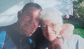 Remove oxygen tubes from funeral photo?