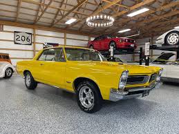 Image result for Canary Yellow 1965 AC Cars