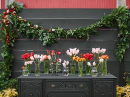 Take one stem at a time with one hand, and use your other hand to hold the flowers in. How To Make Wedding Garland With Flowers How Tos Diy