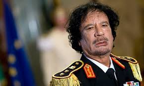 Gaddafi with a couple of his private guards, known as amazons, on a visit to italy. Colonel Muammar Gaddafi Obituary Muammar Gaddafi The Guardian