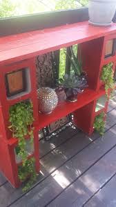 Decorating My Condo Balcony With A Diy Cinder Block Plant Stand Bar And Tablerunner Turned Rug Condo Balcony Plant Stand Cinder Block