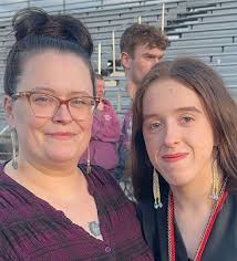 Photo edit request for graduate sculpture with gold cord addition