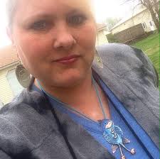 Wearing handmade blue jay bird jewelry