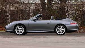 The 1963 porsche crest is proudly presented on the bonnet, the sports steering wheel, the key and the wheel centres of the 911 targa 4s heritage. 2003 Porsche 911 Carrera 4 Cabriolet F99 Indy 2016