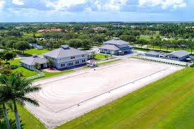 Palm Beach Point Gated Equestrian Compound In Wellington Florida Outdoor Riding Arena Riding Arenas Dream Stables Outdoor