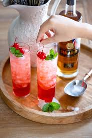 A blend of cherry, lime, rum or vodka and fizzy lemon lime soda or sparkling beverage. Dirty Shirley Malabar