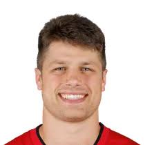 AJ Barner or Cade Otton