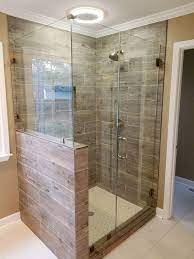 A sliding door leads to the toilet and bathtub, allowing for a degree of privacy. Modern Shower Door Ideas Novocom Top