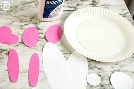 For an easter celebration later in the day, place the cookie cutters on a small plate and fill with pistachios or a single color of easter m&m's. Easter Bunny Paper Plate Craft With Free Bunny Template Natural Beach Living