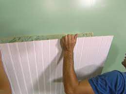Change up plain bathroom walls with beaded hardwood planks and trim you can install yourself. How To Install Beadboard Wainscoting How Tos Diy