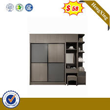 Beautifully crafted from solid wood and painted in a soft moonlight grey complemented by contrasting dark handles t his is a truly stylish grey bedroom. China Dark Grey Wood Sliding Wardrobe Walk In Closet With Makeup Table Bedroom Furniture Photos Pictures Made In China Com