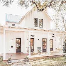 Mixed with gold accents, it is modern farmhouse perfection! We Love This Cute White Farmhouse That Porch Looks Perfect For A Summer Night Do You Love This House Farmhouse Remodel House Exterior Farmhouse Plans