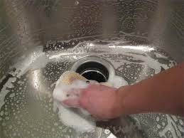 To clean the sink in the kitchen. How To Clean Your Kitchen Sink Disposal Household Cleaning Tips Cleaning Hacks Clean Stainless Sink