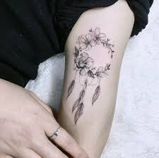 Arm Black And White Dream Catcher Tattoo Inside Arm Tattoo Floral Dream Catcher Tattoo On Arm Black Sweater Silver Ring White Blanket In 2020 Dream Catcher Tattoo Inside Of Arm Tattoo Tattoos