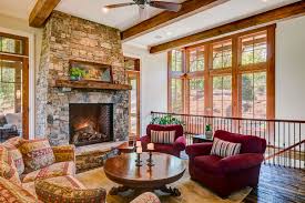 If you have an open floor plan which. Stone Fireplace Den With Open Staircase To Basement Acm Design Architecture Interiors