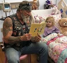 The boy asked me to hold his hand while he died because his dad wouldn't.  I'm a sixty-three-year-old biker covered in tattoos with a beard down to my  chest. I've buried war