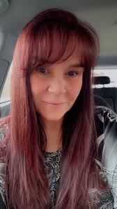 What hair color recommendations are available for a postpartum woman?