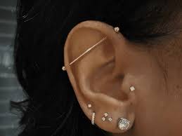 How To Treat Infected Ear Piercings, According To Derms