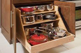 Before i found my pot rack, i looked at other options on pinterest. Simple Kitchen Ideas With Wooden Base Roll Out Pots Pans Organizer With Pot And Pan Cabin Kitchen Cabinet Storage Solid Wood Kitchen Cabinets Kitchen Cupboards