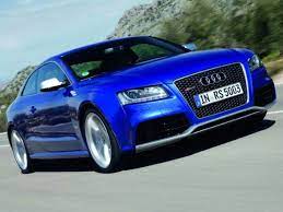 Loads Of Energy Hiding Inside A Typically Elegant Coupe The Audi Rs5 Will Debut In The 2010 Geneva Auto Show Our Prime Revving 4 2 Lite Audi Rs5 Audi Audi Rs