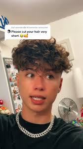 Kris Cutting His Hair