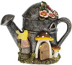 Amazon Com Midwest Cbk Watering Can House Led Solar Garden Statue Garden Outdoor Disney Garden Statues Disney Garden Garden Statues