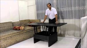 Coffee tables are for more than just coffee. Smart Space Saving Coffee Converts To Dining Table Youtube