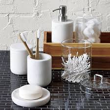 Grey and white bathrooms look smart, clean, stylish, and provide a calming backdrop in which we can relax our mind, body and soul. 15 Budget Friendly Marble Bathroom Accessories The Sweetest Digs