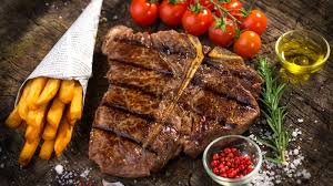The ribeye steak usually has one bone towards the outside or no bone. Porterhouse Vs Ribeye Which Is Better Steak Revolution