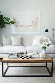 A pair of matching side tables are a terrific alternative to a traditional coffee table. How To Style A Coffee Table Like A Pro