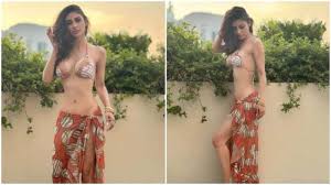 Mouni Roy flaunts her toned abs in a stunning swimwear