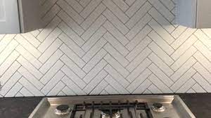 The kitchen backsplash is more than functional. Herringbone Backsplash Completed Youtube