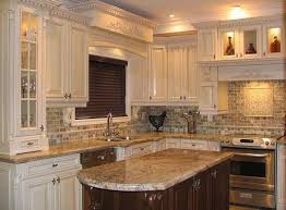 Old World Style Kitchen Love The Detailed Carved Off White Cabinets Gra Kitchen Backsplash Designs Traditional Kitchen Cabinets Traditional Kitchen Design