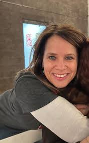 Hi, I'm a 53-year-old single mom of four from Gilbert