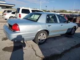 Image result for Light Ice Blue 2003 Crown Victoria