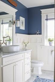 Designing a bathroom on a budget? Home Tour Saw Nail And Paint Beach House Bathroom Blue White Bathrooms House Bathroom