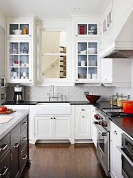 First, edit down your dishware collection to avoid overcrowding the cabinets. Glass Front Cabinetry Better Homes Gardens